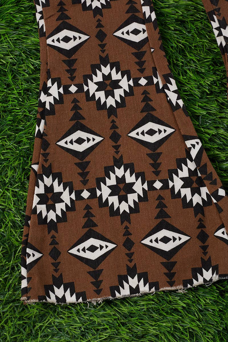 Brown aztec printed bootcut denim pants. PNG25153091 amy: Brown aztec